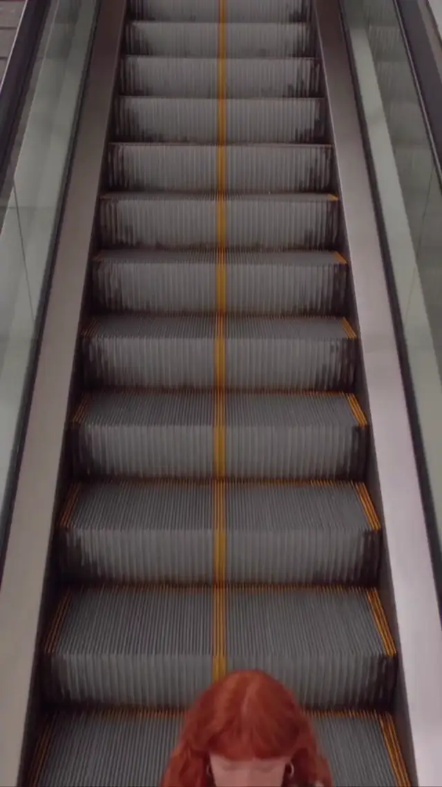 Escalator Drift Rhythmic Vertical Flow Through Fashion