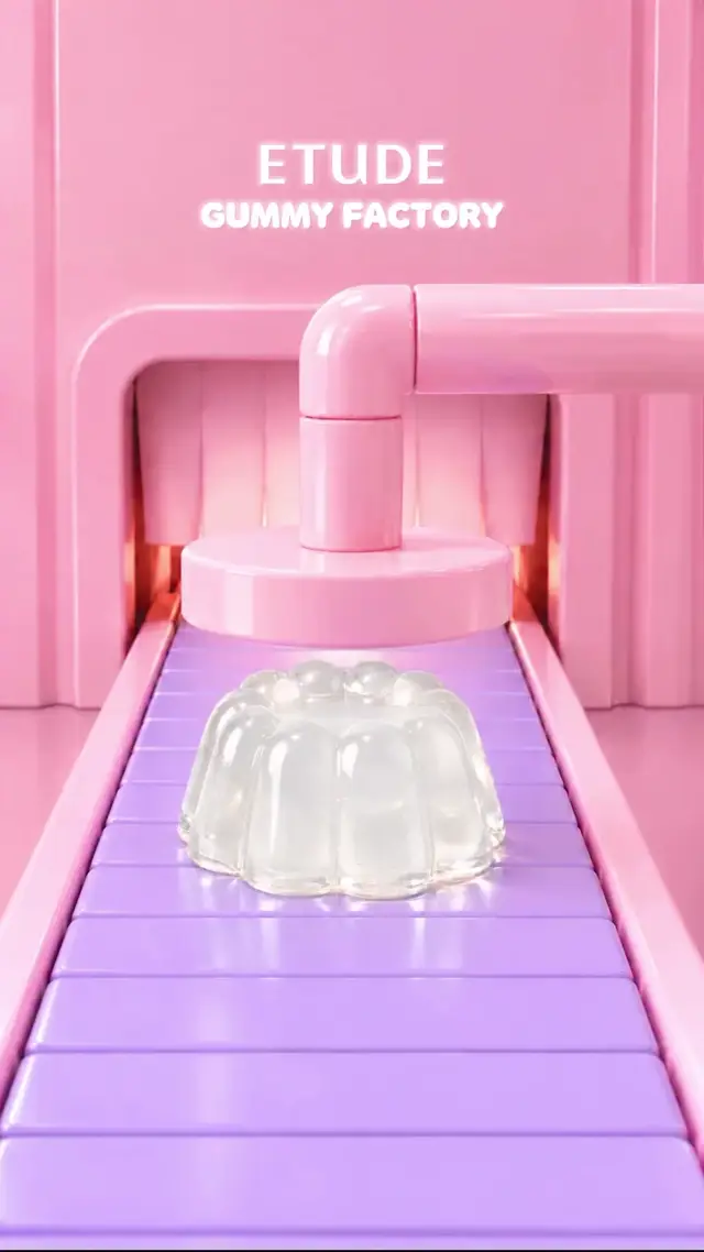 Crimson and orange gummies roll down a lavender conveyor belt before pink letters pop into view announcing a sweet facto